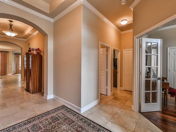 In the entryway you can choose the hallway to your retreat, the stud,y or into the family room.