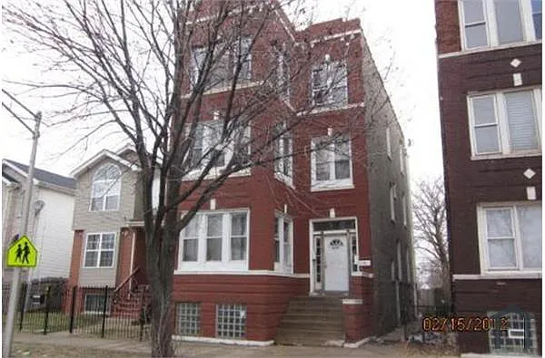 Building Photo - 1417 S Tripp Ave #2