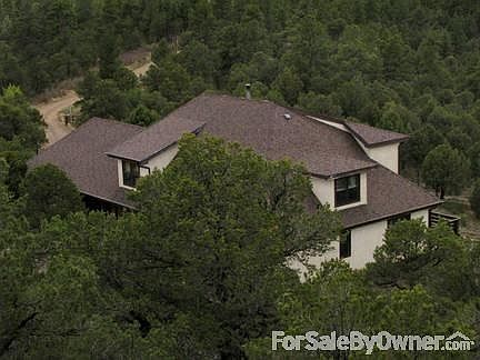 Exterior. View from top of Mound. Pinon Pine, Cedar & Juniper Trees grow around.