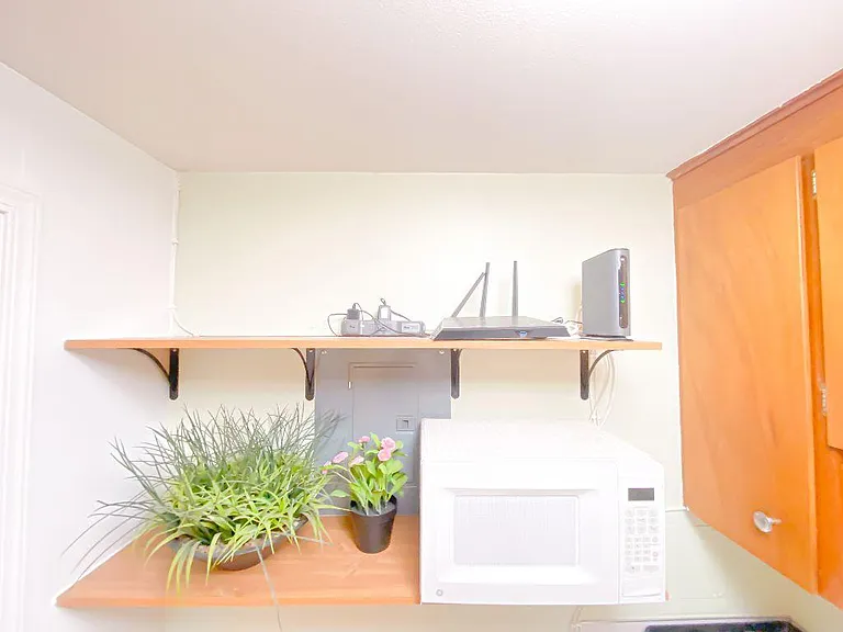 modem, router and cable TV box in the unit.