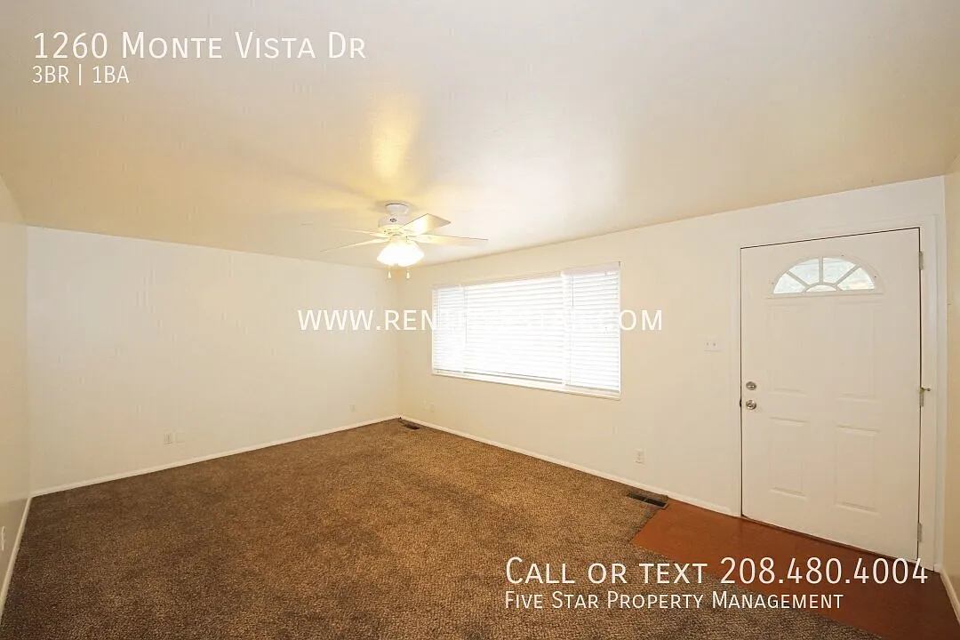 Bright 3 Bedroom, 1 Bathroom Upstairs Unit with Private Deck, Fenced Yard, and Garage! — Photo 2