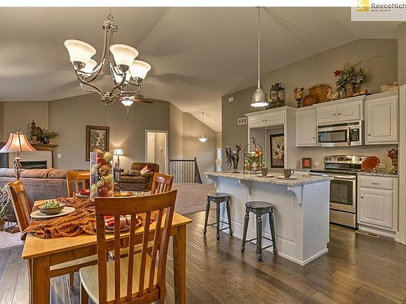 View of bar and eating area into great room.