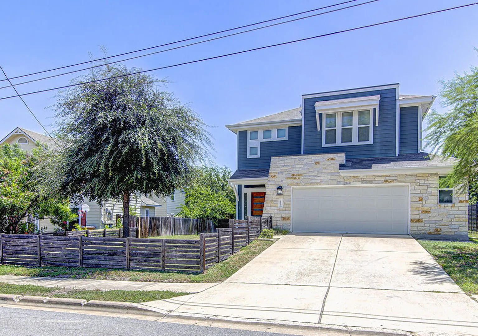 Elegant 4BR Home with Bonus Room & Designer Finishes — Photo 2