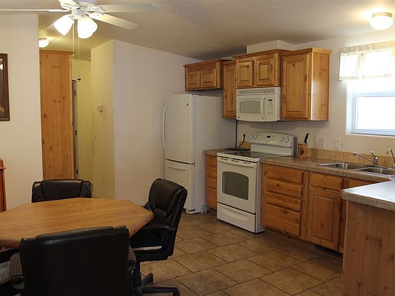 5th image of 9714 E 33rd Pl