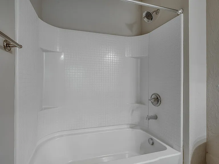 Experience the luxury of this stylish bathroom, combining modern design with comfort.