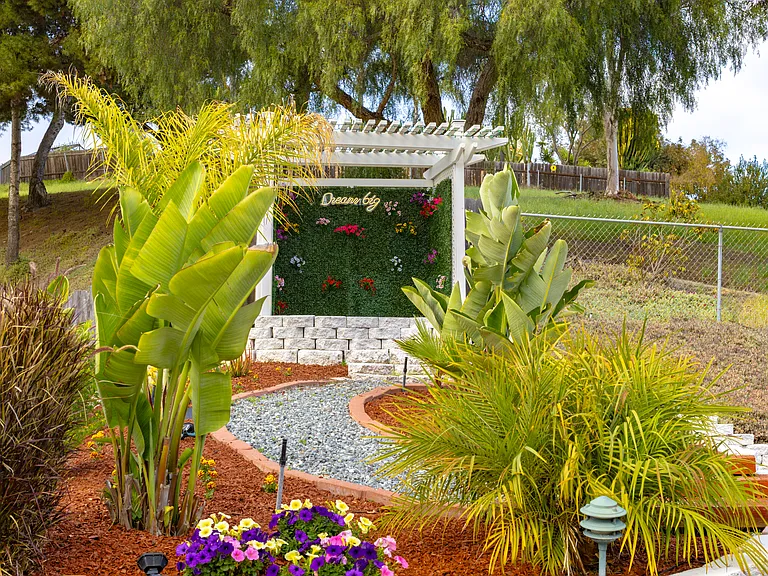 Outdoor area is great for fires, griling, or just hanging out. Umbrella canopy, and Santa Maria grill included with house!