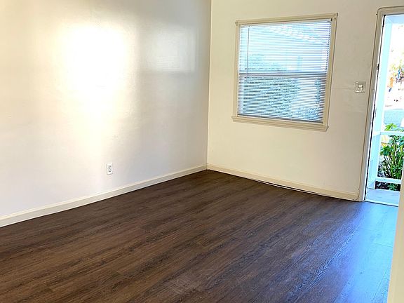 Living room and front door.