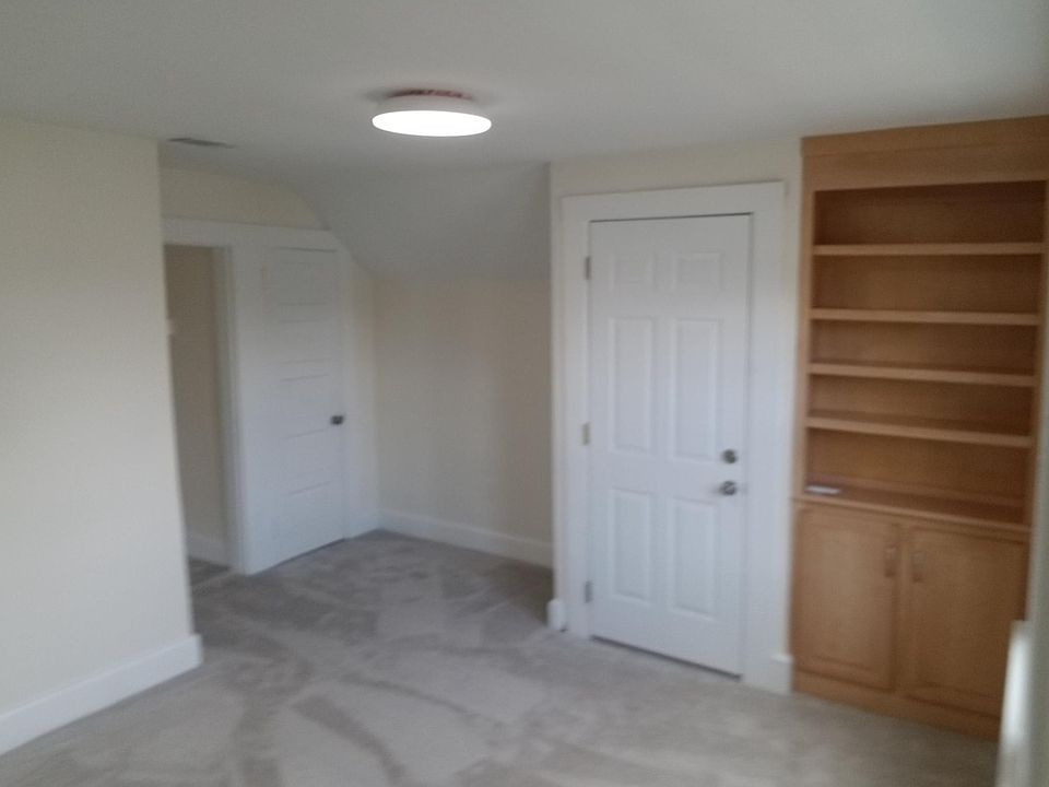 Living Room Picture of Front Staircase Door (Right) and Deep