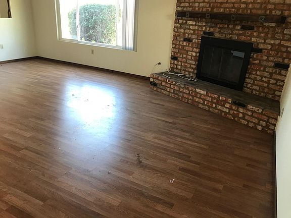 Wood burning fireplace in living room