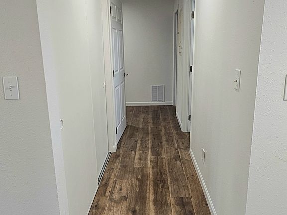 The grand hallway is a separate wing to access all the bedroom conveniently.