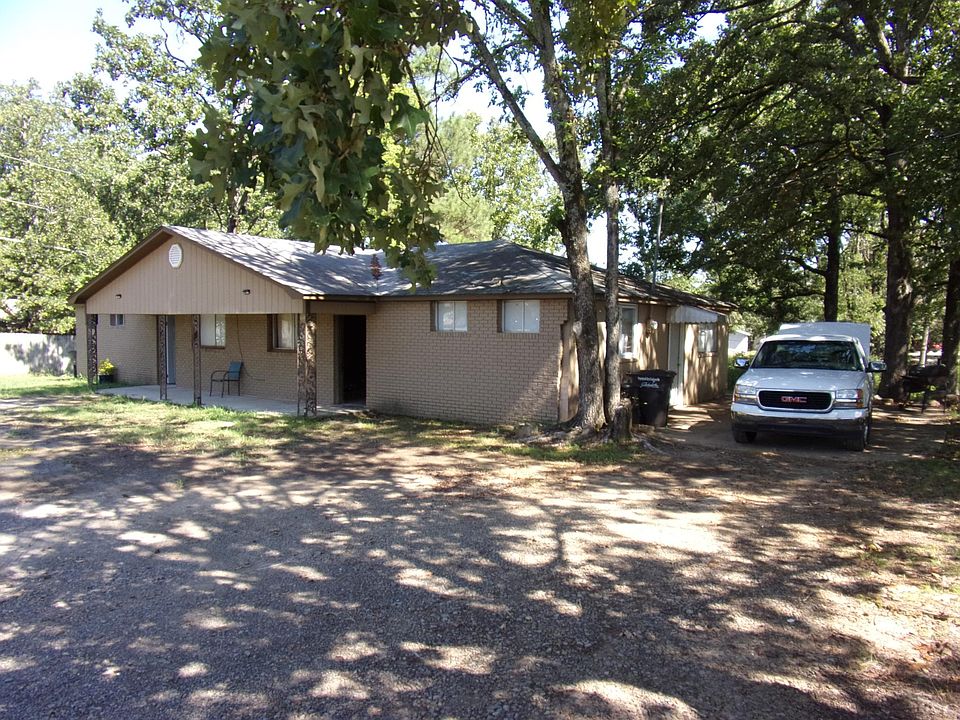 Building has covered front porch and side entrance