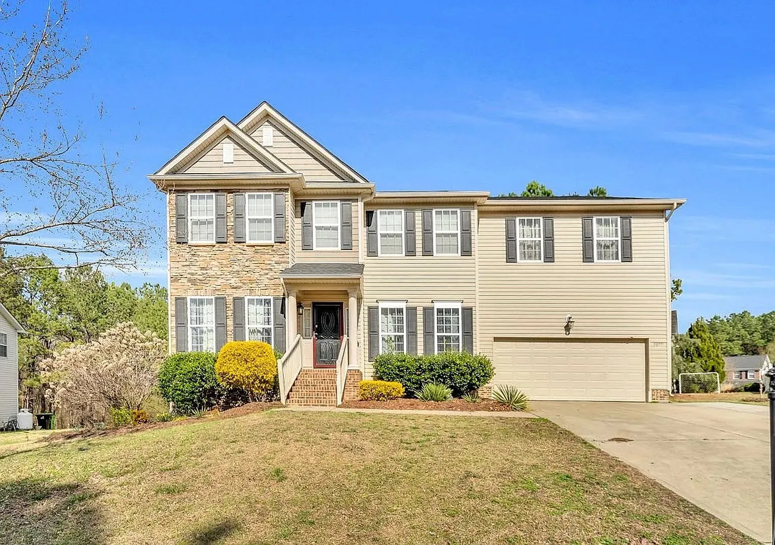 Room in 4 Bedroom Home at 5077 Stonewood Pines Dr — Photo 1