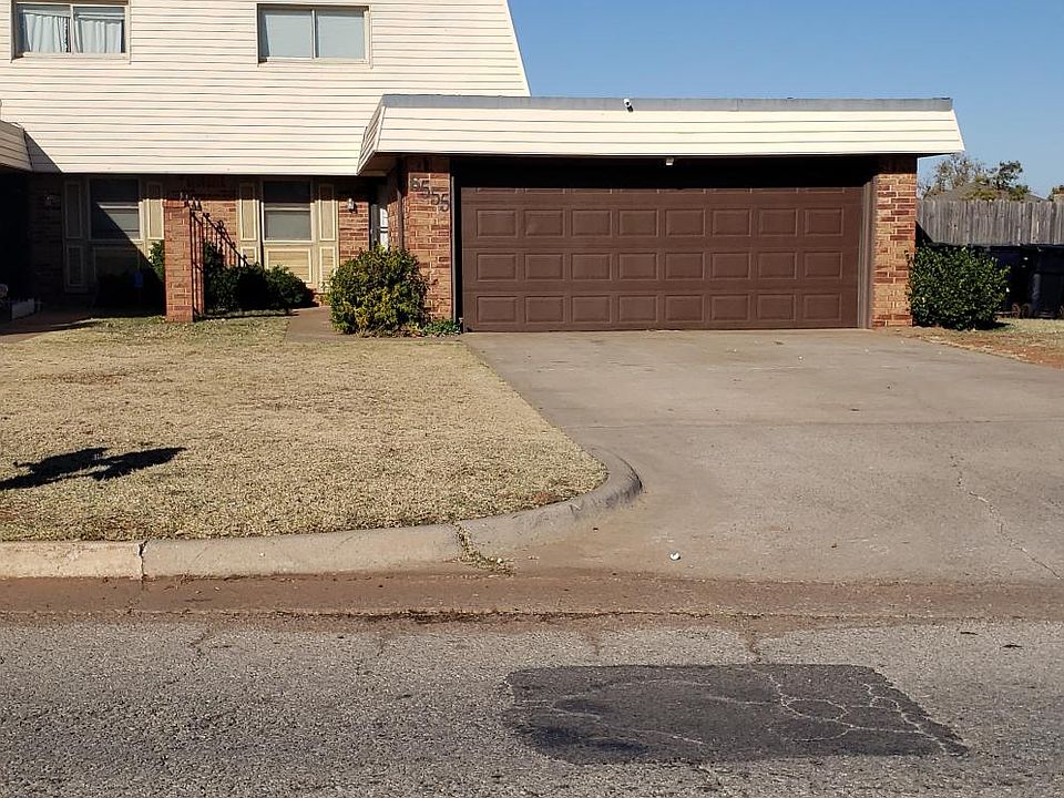 Front. Two car garage with automatic garage door.