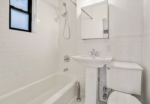 5th image of 513 E 82nd St APT 3A