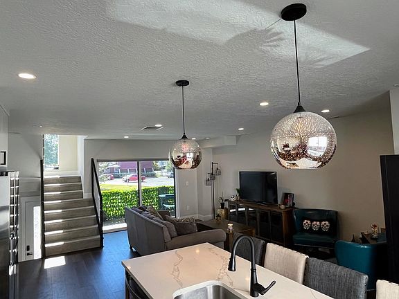 View of main floor from kitchen into living room.