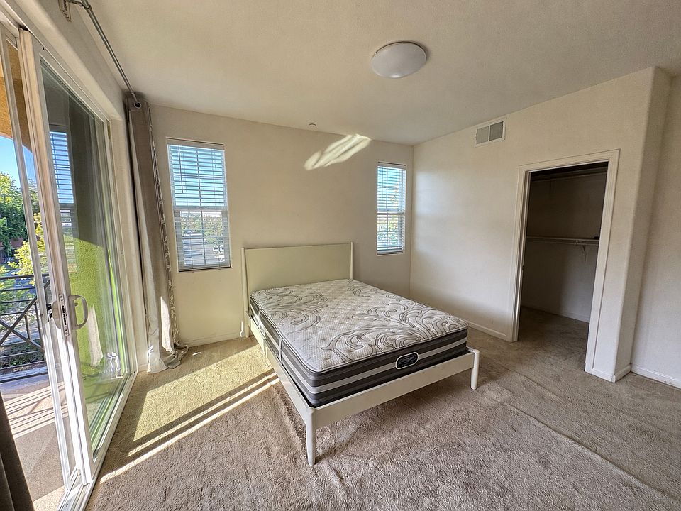 Spacious master suite with private balcony and walk-in closet