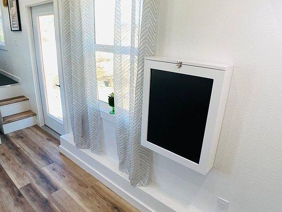 Chalk board with mini-split AC above