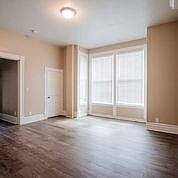 Living area 1, windows face East. Room for seating and sleeping