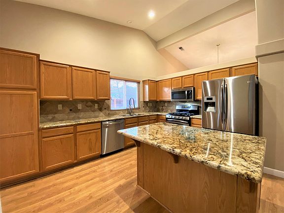 Kitchen with Granite Counters & Stainless Appliances