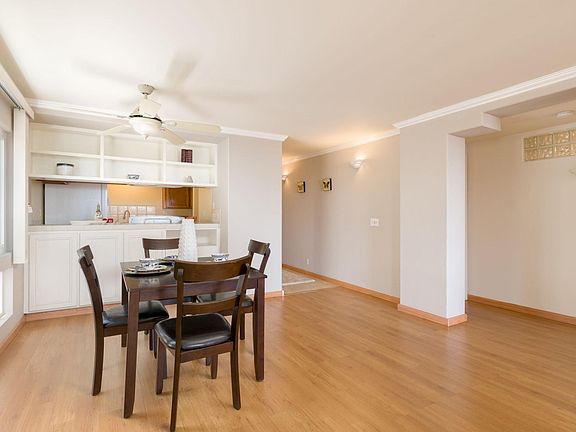 Dining View to Kitchen, Hall and Entry
