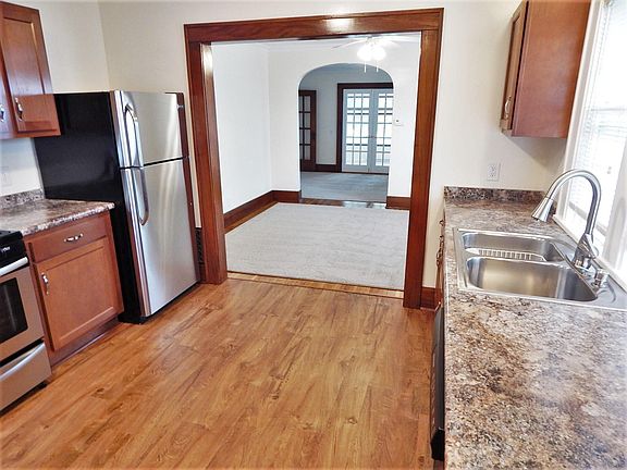 Kitchen Looking into Dining Room and Living Room