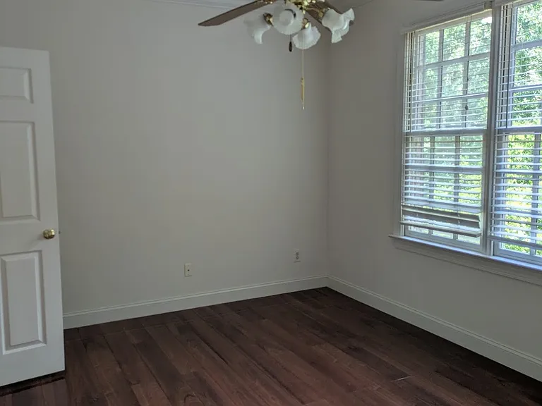 Another 1st Bedroom view. Windows overlook the back yard and deck.