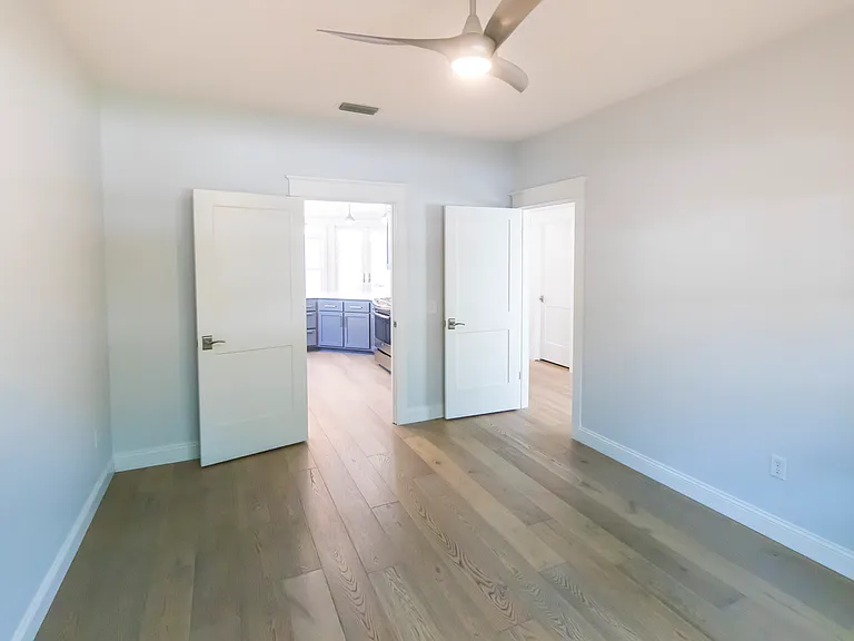 4th flexible room is very large. It connects to the kitchen and to the hallway leading to the front door.