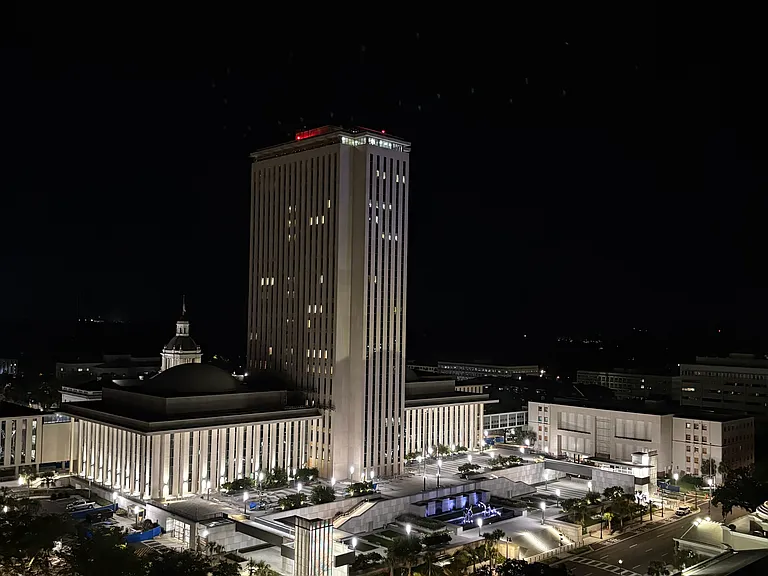 The Capital at night from the balcony of the unit