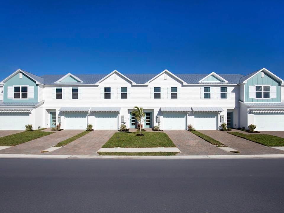 Bright, charming exteriors with metal roofs offer simple, low-maintenance living.