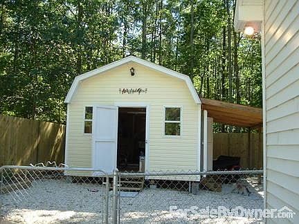 Awesome Shop!
						:
						Elect, cable, heat & AC, large loft for storage. Doggie door.