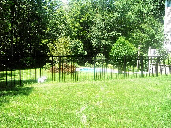 View of pool and part of back garden