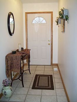 View of the foyer area, large entry closet in this area.