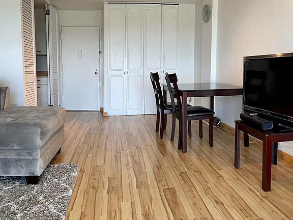 New floors installed, large closet next to the front door. Open space.