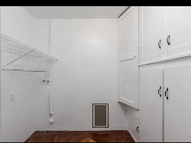 laundry room with storage. washer and dryer included (not pictured)