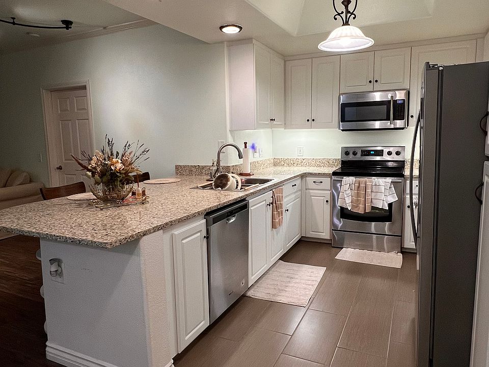 1st image of 9237 Regents Rd #208