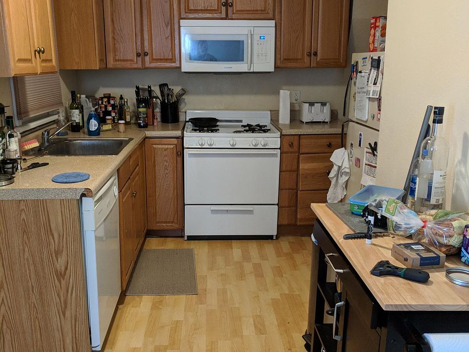 Kitchen with Dishwasher, gas stove, microwave and a pantry!