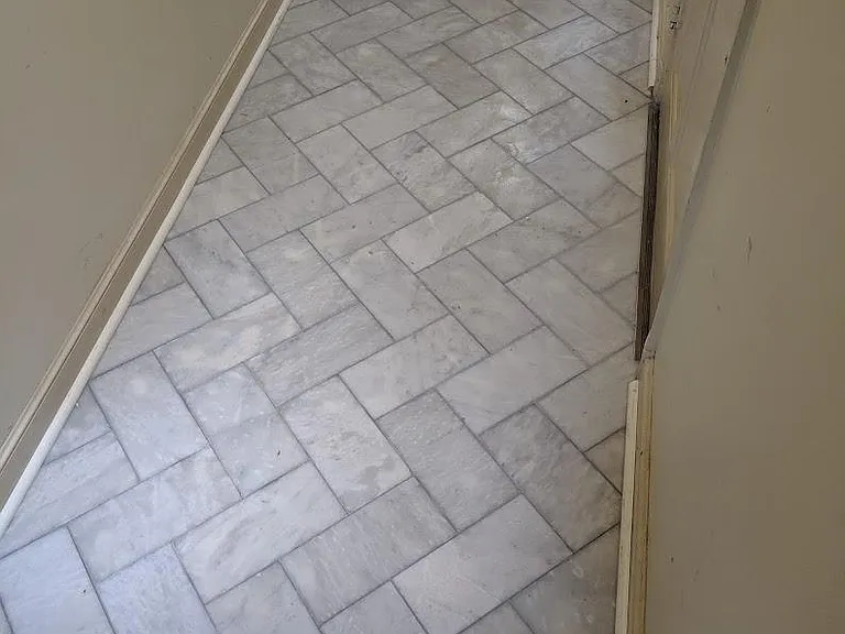 Common hallway marble flooring installed 2019.