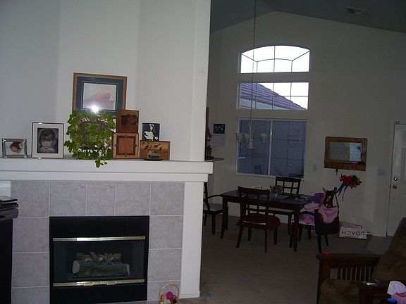 View of dining room with large window looking out towards mountains