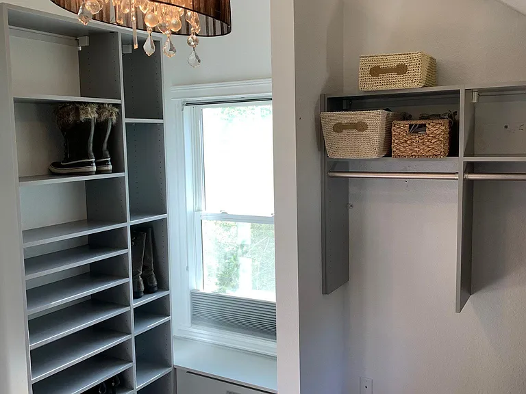 half of the very large walk-in closet room that is off the master bath and bedroom