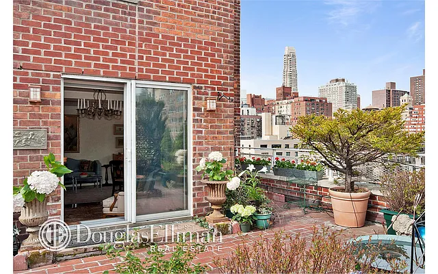 Sold by Douglas Elliman | media 18