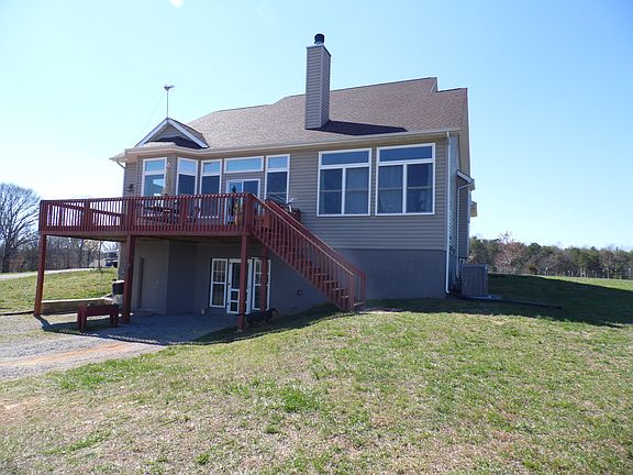 Rear view of house with deck