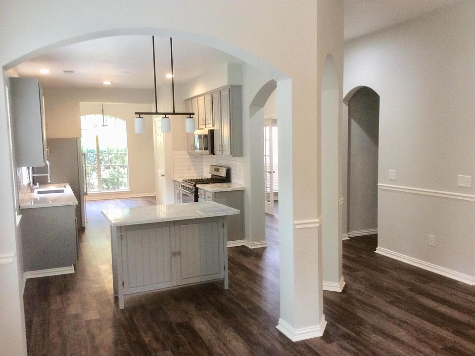 View from Living Room into Kitchen & Dining Room