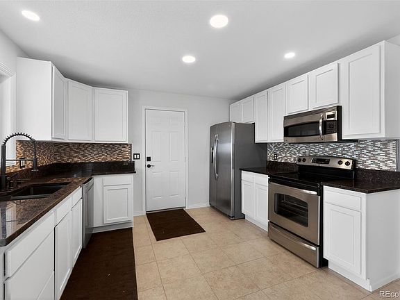 5th image of 2546 E 99th Avenue
