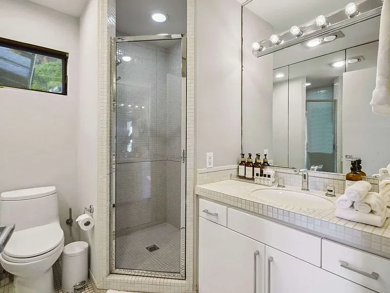 Luxurious amenities like shampoo, conditioner, and body soap are always on hand.