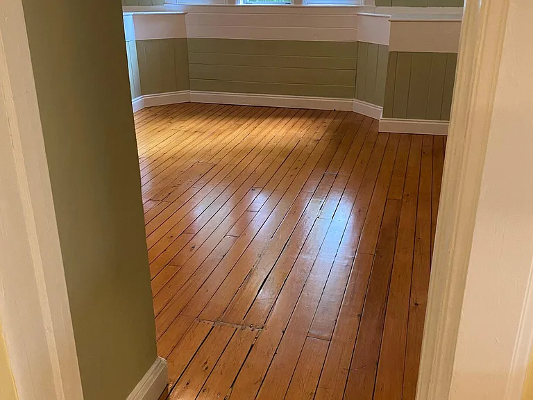 Entrance from Kitchen to Living Room with Lofted Ceilings
