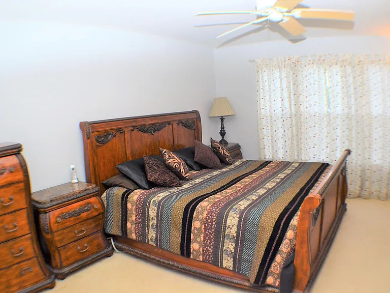 Master bedroom with walk in closet and attached Master bathroom