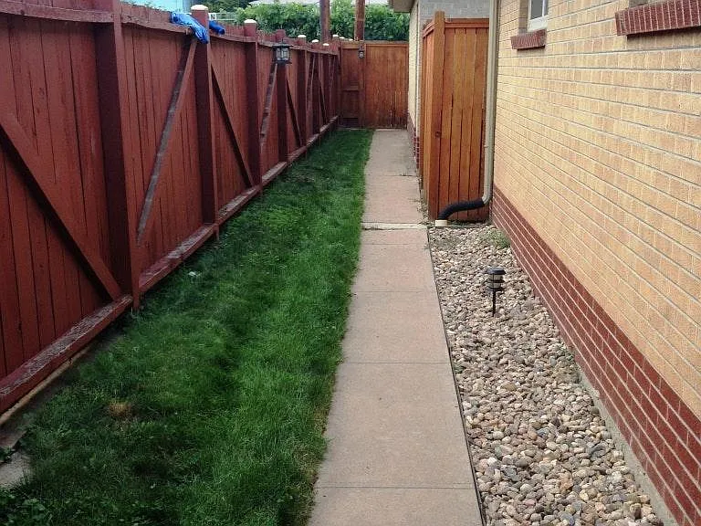 Side fenced in yard
