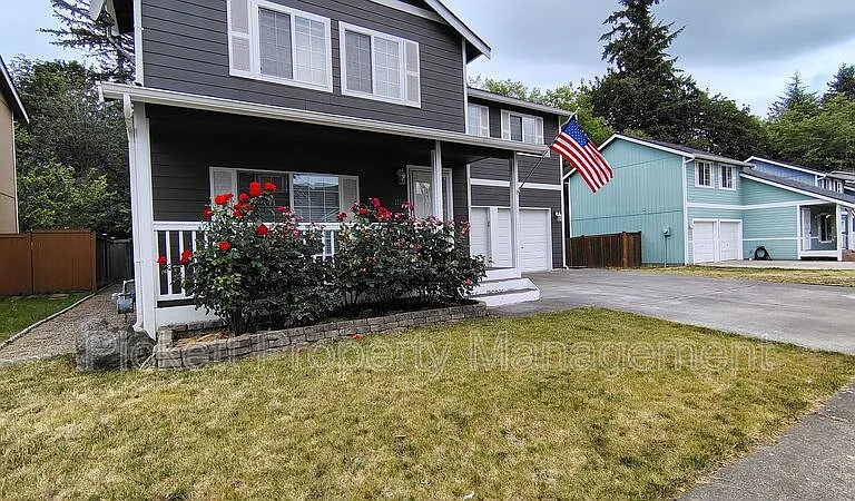 1108 NE Beaumont Ln — Photo 2