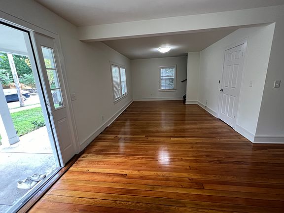 Front door opens to living room area on left