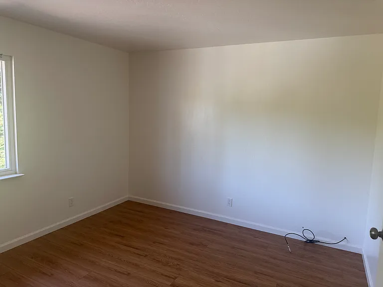 Bedroom--hardwood floors and very large!